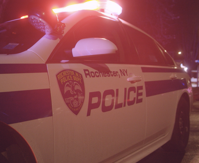RPD car at night with siren on.